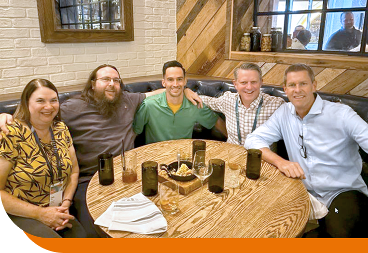 Availent Team Members Sitting in a Booth